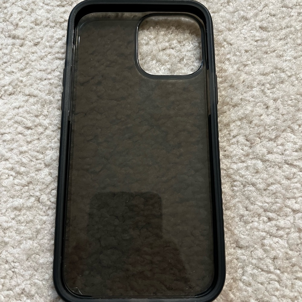 Black semi transparent body guardz case.